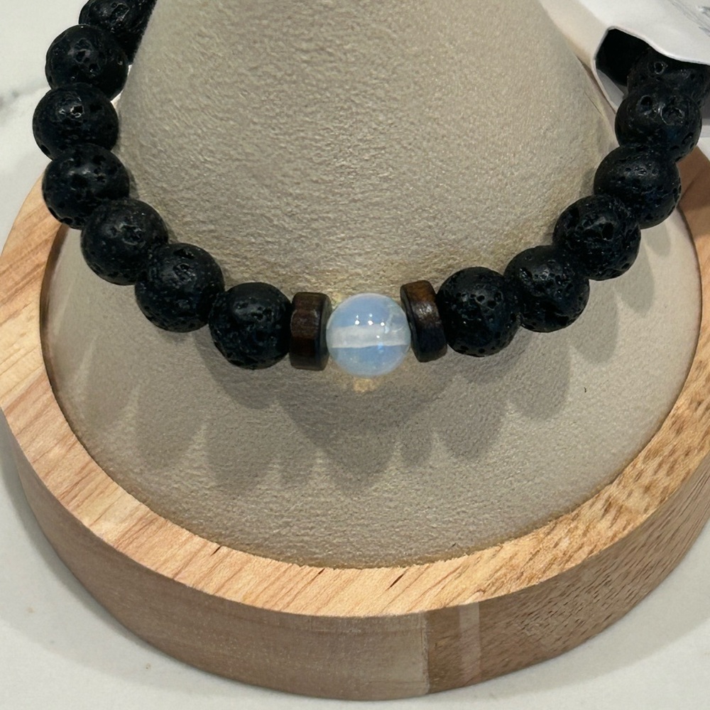 OSHENA Black Lava Bead Bracelet with Iridescent Center Stone
